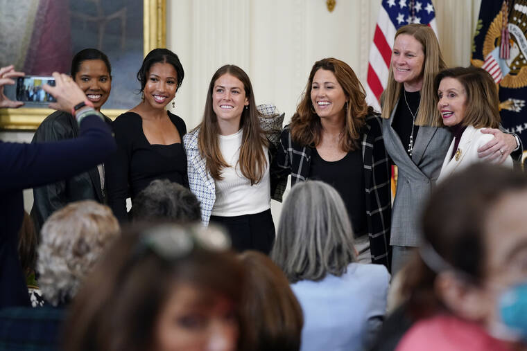 ASSOCIATED PRESS
                                Former members and members of the U.S. Women’s National soccer team, from left, Briana Scurry, Margaret ‘Midge’ Purce, Kelley O’Hara, Julie Foudy, and Cindy Parlow Cone, President of U.S. Soccer, posed for a photo with House Speaker Nancy Pelosi of Calif., before an event to celebrate Equal Pay Day and Women’s History Month in the East Room of the White House, March 15, in Washington.