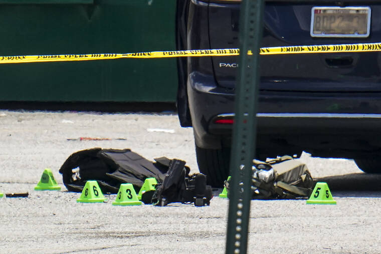 ASSOCIATED PRESS / 2021
                                Body armor and evidence markers rest on the tarmac by a minivan near a mall parking area where two Baltimore city police officers were shot and a suspect was killed as a U.S. Marshals’ task force served a warrant in Baltimore, Md. When a shooter attacked a supermarket in Buffalo, New York, May 14, its security guard tried to stop him. At least one of the guard’s shots hit the gunman, but it didn’t stop the deadly rampage because the gunman was wearing body armor.