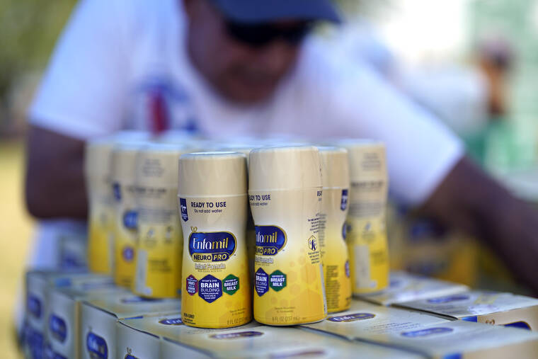 ASSOCIATED PRESS
                                Infant formula was stacked on a table during a baby formula drive to help with the shortage, Saturday, in Houston. President Joe Biden today invoked the Defense Production Act to speed production of infant formula and authorized flights to import supply from overseas, as he faces mounting political pressure over a domestic shortage caused by the safety-related closure of the country’s largest formula manufacturing plant.
