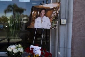 ASSOCIATED PRESS
                                A photo of Dr. John Cheng is displayed outside his office in Aliso Viejo, Calif., on Monday.
