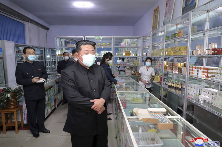KOREAN CENTRAL NEWS AGENCY/KOREA NEWS SERVICE VIA AP
                                In this photo provided by the North Korean government, North Korean leader Kim Jong Un, center, visits a pharmacy in Pyongyang, North Korea on Sunday.