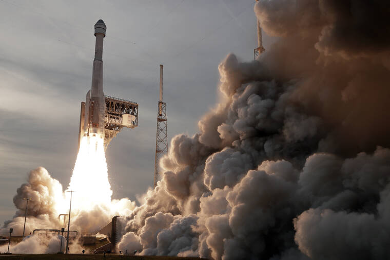 JOHN RAOUX / AP
                                A United Launch Alliance Atlas V rocket carrying the Boeing Starliner crew capsule lifts off on a second test flight to the International Space Station from Space Launch Complex 41 at Cape Canaveral Space Force station in Cape Canaveral, Fla.
