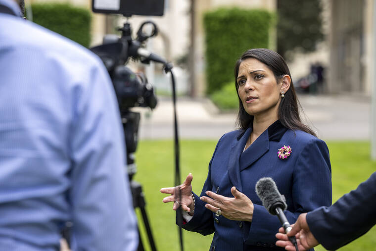 ASSOCIATED PRESS
                                Britain’s Home Secretary Priti Patel speaks during an interview with the Associated Press at the European headquarters of the United Nations in Geneva, Switzerland, today.
