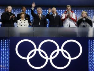 ASSOCIATED PRESS / 2014
                                International Olympic Committee (IOC) President Thomas Bach, third from left, and Russian President Vladimir Putin, third from right, wave to spectators during the closing ceremony of the 2014 Winter Olympics in Sochi, Russia.