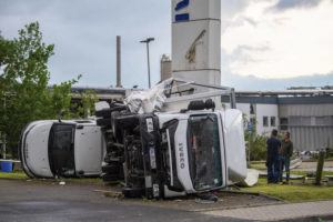 DPA / AP
                                Two trucks overturned after a storm in Paderborn, Germany.