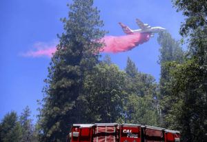 THE UNION / AP
                                A type 1 air tanker makes a large retardant drop along a line of the Golden Fire south of Camptonville, Calif.