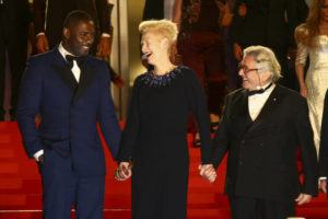 INVISION / AP / MAY 20
                                Idris Elba, from left, Tilda Swinton, and director George Miller pose for photographers upon departure from the premiere of the film ‘Three Thousand Years of Longing’ at the 75th international film festival, Cannes, southern France.