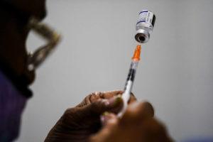 ASSOCIATED PRESS / DEC. 15
                                A syringe is prepared with the Pfizer COVID-19 vaccine at a vaccination clinic at the Keystone First Wellness Center in Chester, Pa.