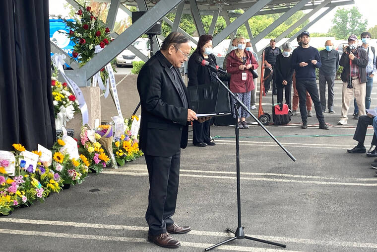 AMY TAXIN / AP
                                Pastor Albany Lee addresses congregants and community members, as survivors and church leaders join in prayer and thank community members for their support nearly a week after a deadly shooting at a Taiwanese American church congregation in Laguna Woods, Calif.