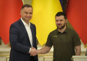 ASSOCIATED PRESS Ukrainian President Volodymyr Zelenskyy, right, and Polish President Andrzej Duda shake hands during a news conference after their meeting in Kyiv, Ukraine.