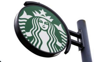 ASSOCIATED PRESS
                                A sign at a Starbucks location was seen on April 26. In a memo to employees today, the Seattle coffee giant said it decided to close its 130 stores and no longer have a brand presence in Russia.
