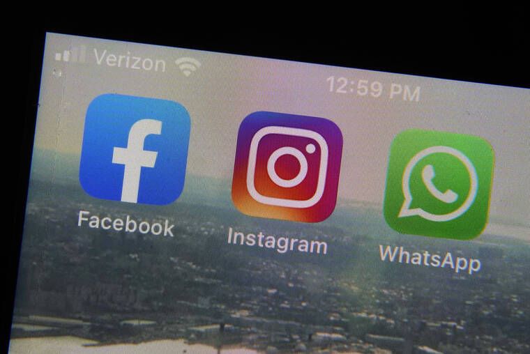 ASSOCIATED PRESS
                                The mobile phone apps for, from left, Facebook, Instagram and WhatsApp were shown on a device in New York. The company that owns Facebook and Instagram said, today, it will begin revealing more details about how advertisers target people with certain political ads, just months before the U.S. Midterm elections.