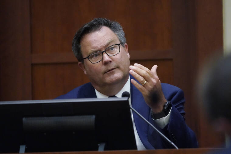 ASSOCIATED PRESS
                                Dr. Richard Moore, Jr., testified in the courtroom at the Fairfax County Circuit Courthouse in Fairfax, Va., today. Actor Johnny Depp sued his ex-wife Amber Heard for libel in Fairfax County Circuit Court after she wrote an op-ed piece in The Washington Post in 2018 referring to herself as a “public figure representing domestic abuse.”