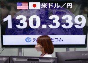 KYODO NEWS / AP
                                A financial monitor shows Japanese yen’s exchange rate against the U.S. dollar at a currency dealing house in Tokyo.