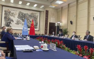 UN HUMAN RIGHTS OFFICE VIA AP
                                Chinese Foreign Minister Wang Yi at right meets with the United Nations High Commissioner for Human Rights Michelle Bachelet in Guangzhou on Monday.