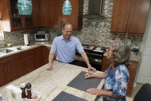 ASSOCIATED PRESS
                                Mark Bendell and his wife Laurie talk in their kitchen, Monday, in Boca Raton, Fla. A stock market slump this year, which has taken big bites out of investors’ portfolios, including retirement plans like 401(k)s, is worrying Americans who are within a few years of retirement.