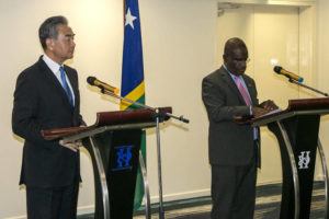 ASSOCIATED PRESS
                                China’s Foreign Minister Wang Yi, left, and his counterpart from the Solomon Islands, Jeremiah Manele hold a joint news conference in Honiara, Solomon Islands, early Thursday.