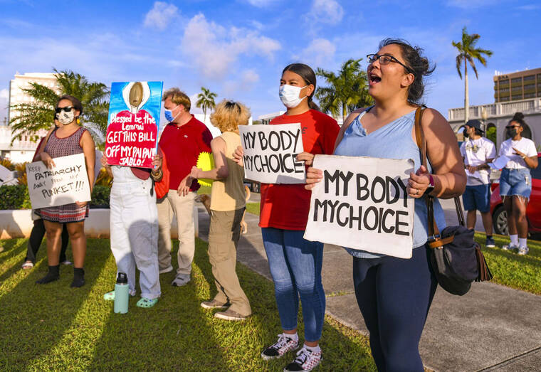 THE PACIFIC DAILY VIA AP
                                Protesters rally on the front lawn of the Guam Congress Building in Hagatna as they voice their concerns against the Guam Heartbeat Act of 2022 on April 27.