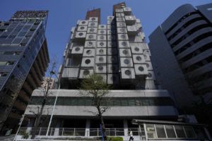ASSOCIATED PRESS
                                The Nakagin Capsule Tower, a famed capsule hotel in the Ginza district, shows its unique architecture of small cubic rooms as parts of the capsule hotel was being demolished in Tokyo on April 8.
