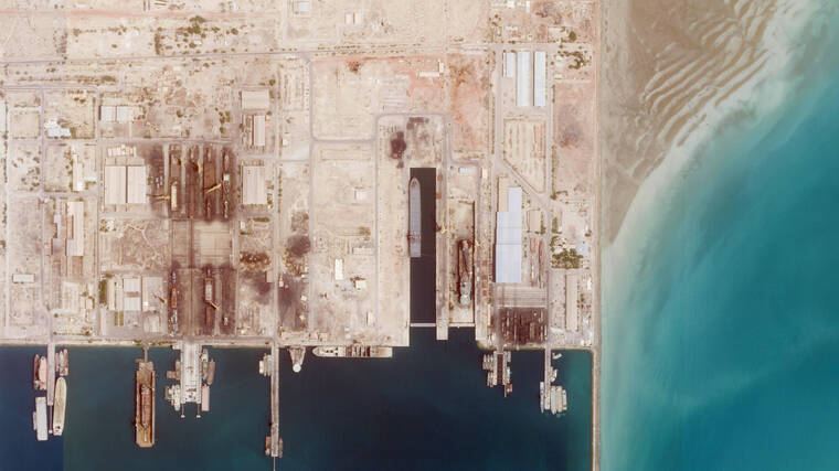 PLANET LABS PBC VIA AP
                                A satellite photo from Planet Labs PBC shows the Iranian Revolutionary Guard’s newest ship, the Shahid Mahdavi, center right, under construction in a shipyard west of Bandar Abbas, Iran, on Saturday.