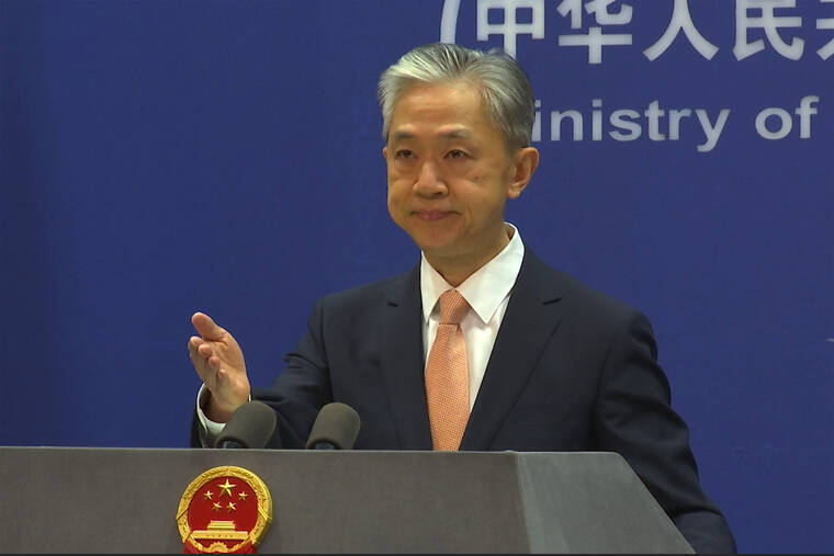 ASSOCIATED PRESS
                                Chinese Foreign Ministry spokesperson Wang Wenbin reacts during the daily presser at the Ministry of Foreign Affairs in Beijing, Friday. China on Friday criticized a speech by U.S. Secretary of State Antony Blinken focused on relations between the world’s top two economic powers, saying the U.S. was seeking to smear Beijing’s reputation.