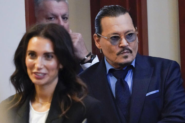 STEVE HELBER, POOL VIA AP
                                Actor Johnny Depp arrives in the courtroom for closing arguments at the Fairfax County Circuit Courthouse in Fairfax, Va. Depp sued his ex-wife Amber Heard for libel in Fairfax County Circuit Court after she wrote an op-ed piece in The Washington Post in 2018 referring to herself as a “public figure representing domestic abuse.”