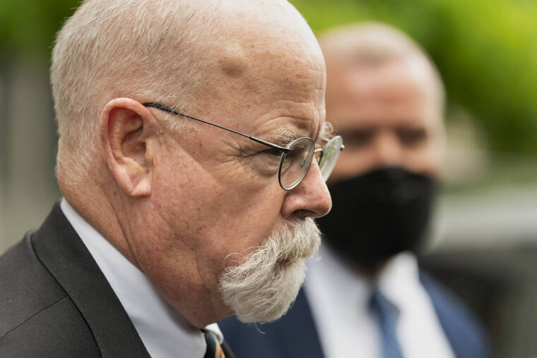 ASSOCIATED PRESS
                                Special counsel John Durham, the prosecutor appointed to investigate potential government wrongdoing in the early days of the Trump-Russia probe, leaves federal court in Washington, May 16. A jury was picked Monday in the trial of a lawyer for the Hillary Clinton presidential campaign who is accused of lying to the FBI as it investigated potential ties between Donald Trump and Russia in 2016.