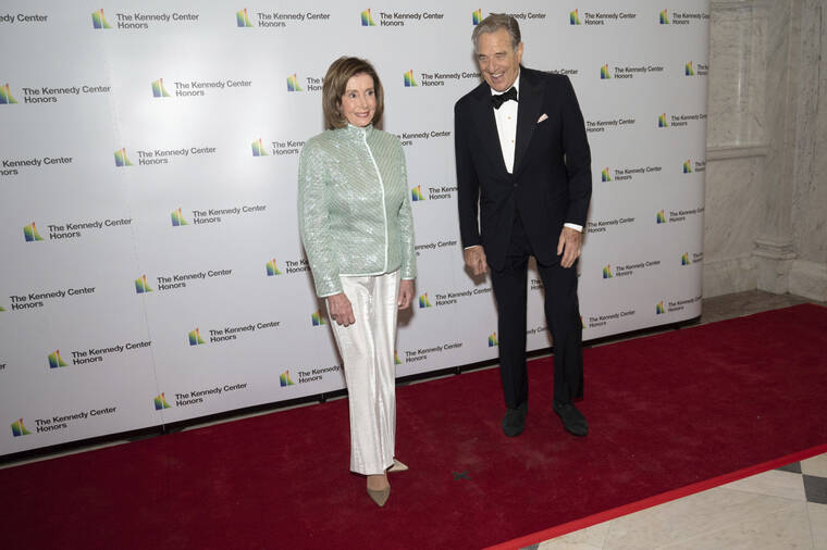 ASSOCIATED PRESS / 2021 House Speaker Nancy Pelosi, D-Calif., and her husband, Paul Pelosi, pose on the red carpet at the Medallion Ceremony for the 44th Annual Kennedy Center Honors on Saturday, Dec. 4, at the Library of Congress in Washington. Authorities say Paul Pelosi was arrested on suspicion of DUI in Northern California, late Saturday, May 28, in Napa County. He could face charges including driving under the influence. Bail was set at $5,000.