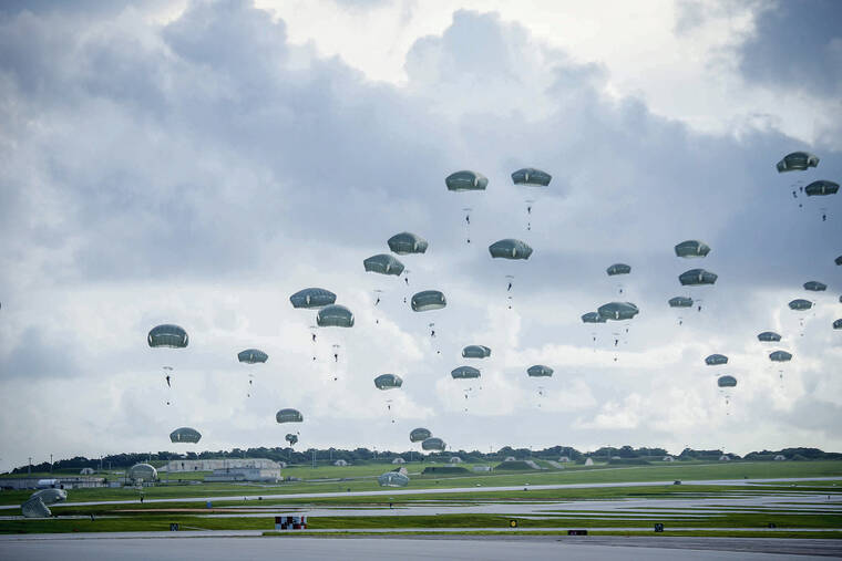 COURTESY U.S. AIR FORCE / 2020
                                Alaska-based units of the 25th Infantry Division will soon be reorganized into the 11th Airborne Division. Paratroopers of the 4th Infantry Brigade Combat Team of the 25th Infantry Division in Alaska jump into Andersen Air Force Base, Guam.
