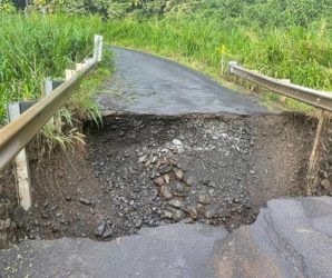 COURTESY MAUI COUNTY
                                Pi’ilani Highway in East Maui has been closed after heavy rainfall triggered landslides and road damage this morning. This Maui County photo shows roadway damage at the Lelekea culvert crossing.