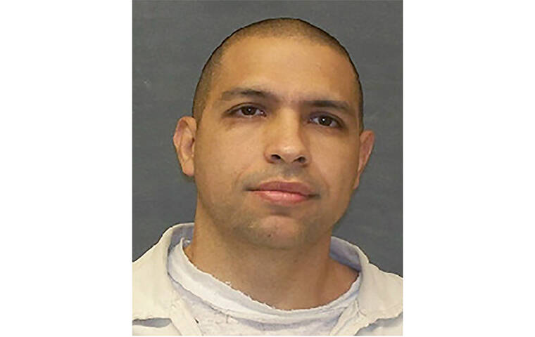 TEXAS DEPARTMENT OF CRIMINAL JUSTICE / AP
                                This undated photo provided by the Texas Department of Criminal Justice shows Gonzalo Lopez, who escaped from a transport bus Thursday after stabbing the driver.