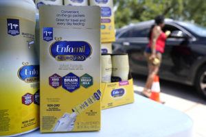 ASSOCIATED PRESS / MAY 14
                                Katherine Gibson-Haynes helps distribute infant formula during a baby formula drive Saturday.