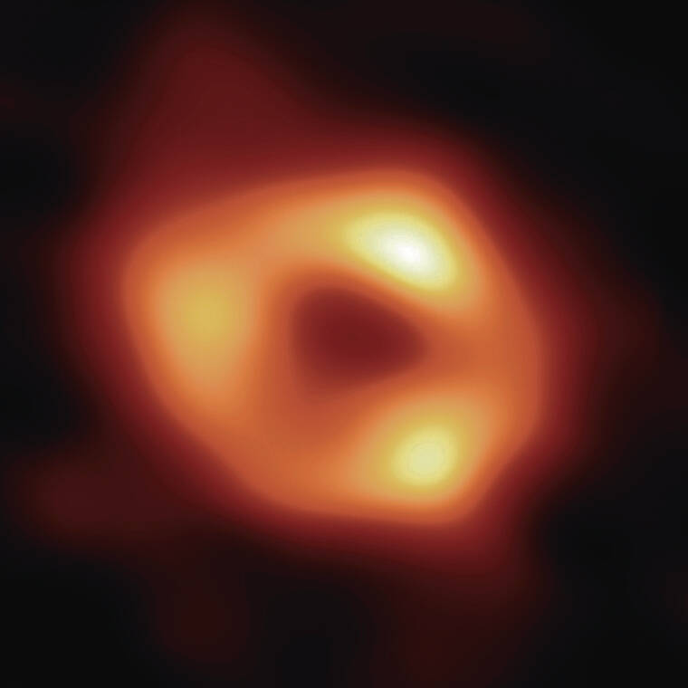 EVENT HORIZON TELESCOPE COLLABORATION
                                This image of a black hole at the center of our Milky Way galaxy was made by eight synchronized radio telescopes around the world, including two on Mauna Kea.