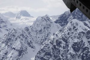ASSOCIATED PRESS / 2016
                                Scene above the Kahiltna Glacier near Denali, as seen through the open cargo bay doors of a Chinook helicopter.