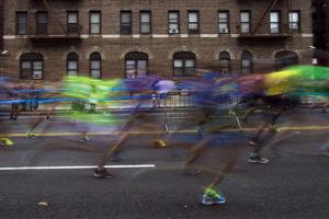 ASSOCIATED PRESS / 2017
                                Runners move along 4th Avenue in the Brooklyn borough of New York during the New York City Marathon.