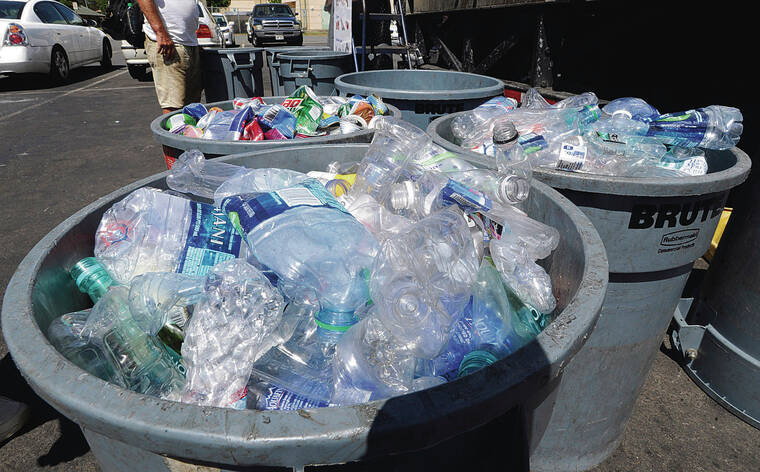 STAR-ADVERTISER / 2015
                                Plastic and aluminum beverage containers were collected at a recycling center in Iwilei.