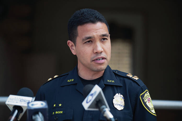 GEORGE F. LEE / GLEE@STARADVERTISER.COM
                                Honolulu Police Capt. Parker Bode held a news conference Friday on the steps of HPD headquarters regarding the shootings at Thomas Square on Thursday night.
