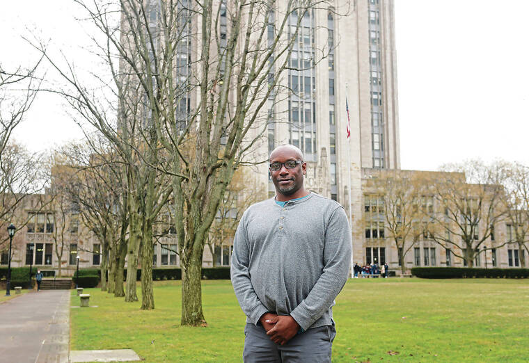 TRIBUNE NEWS SERVICE / FEB. 24
                                Brandon Thomas of Greensburg, Pa., poses for a portrait outside of the University of Pittsburgh’s Cathedral of Learning, in Oakland, Pa. Thomas recently earned his master’s degree in social work from Pitt.