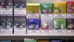 ASSOCIATED PRESS
                                This photo shows various brands and flavors of disposable vape devices at a store in the Brooklyn borough of New York.