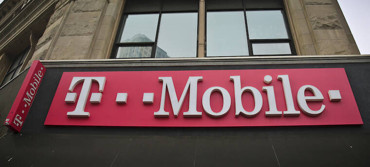 ASSOCIATED PRESS / 2018
                                Signage on a T-Mobile store in New York.