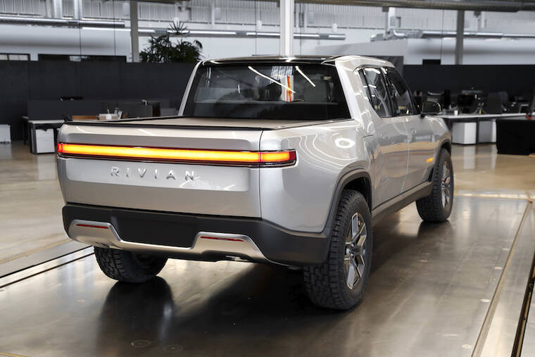 ASSOCIATED PRESS / 2018
                                A Rivian R1T is shown at headquarters in Plymouth, Mich.