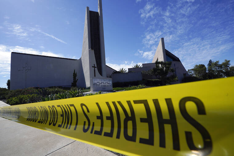 ASSOCIATED PRESS
                                The Geneva Presbyterian Church is taped in Laguna Woods, Calif., today after a fatal shooting.
