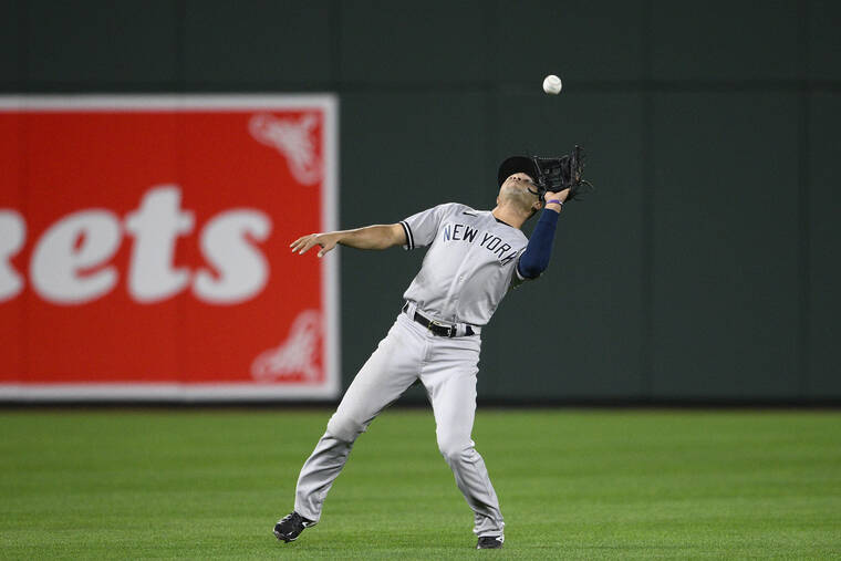 ASSOCIATED PRESS
                                New York Yankees shortstop Isiah Kiner-Falefa makes a catch on Monday.