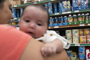 ASSOCIATED PRESS
                                Yury Navas, 29, looks for formula, while holding her two-month-old baby, Jose Ismael Gálvez, at Superbest International Market in Laurel, Md., on Monday.