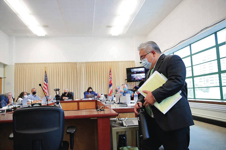 JAMM AQUINO / JAQUINO@STARADVERTISER.COM
                                Keith Hayashi entered the conference room for his interview Thursday at the Board of Education’s Queen Liliuokalani Building. He was one of three finalists who were interviewed.