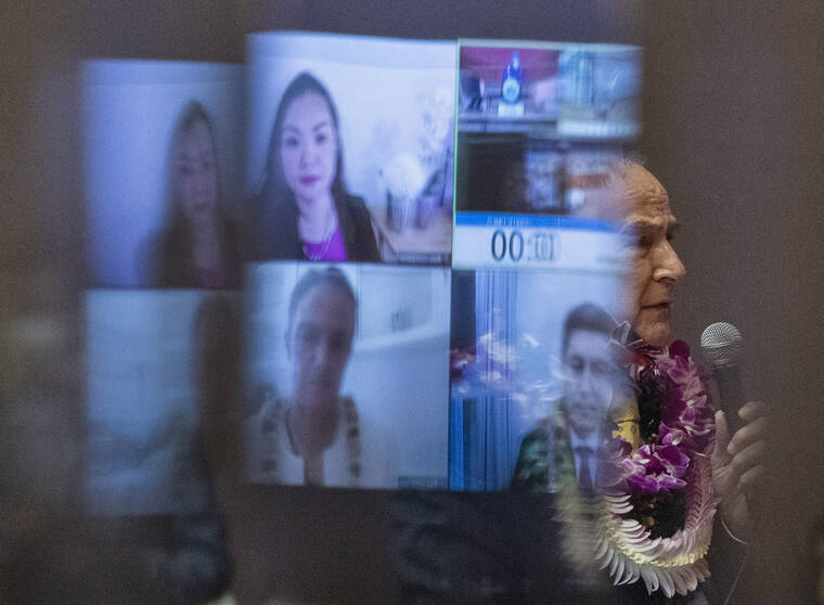 CINDY ELLEN RUSSELL / CRUSSELL@STARADVERTISER.COM
                                Gene Ward (R, Hawaii Kai-Kalama Valley) speaks amidst reflections of representatives attending virtually the opening day of the State Legislature on Jan. 19. Ward, who has served off and on for 12 terms, is seeking reelection.