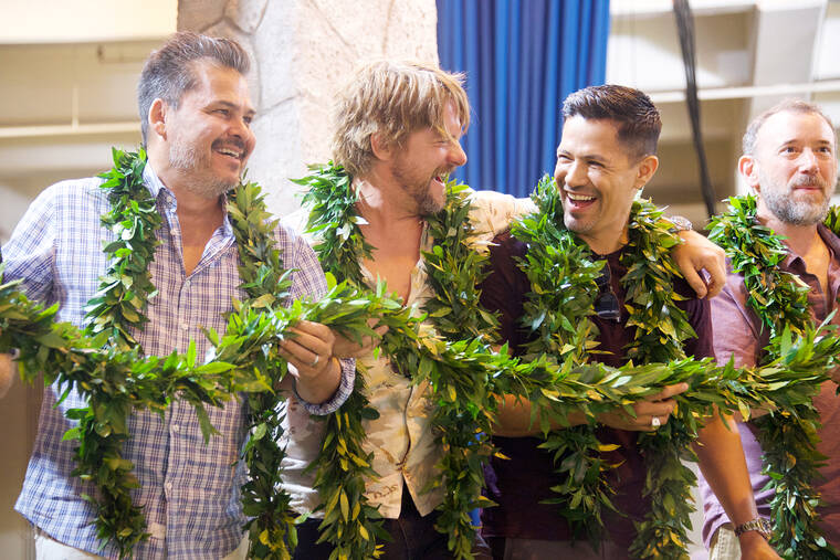 STAR-ADVERTISER FILE
                                Executive producer Peter Lenkov, Zachary Knighton, Jay Hernandez and producer Marc Alpert celebrate the start of filming of season two on July 8, 2019.