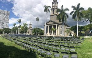 CRAIG T. KOJIMA/CKOJIMA@STARADVERTISER.COM
                                Photo of some 888 or more chairs on front lawn of Central Union to memorialize those in Hawaii who have died from COVID-19. Part of All Saints Day, a Christian remembrance tradition.