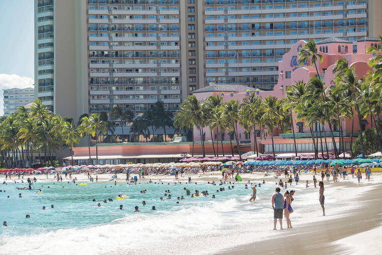 CINDY ELLEN RUSSELL / CRUSSELL@STARADVERTISER.COM
                                The tourism industry is anticipating huge crowds this summer as travel restrictions ease and pandemic fatigue overcomes fear of contracting COVID-19 during travel. Above, the shores of Waikiki were filled with beachgoers Thursday.