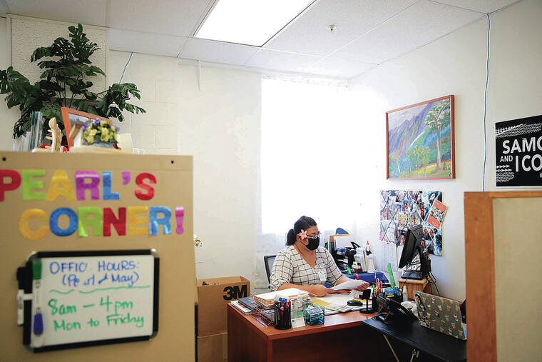 JAMM AQUINO / JAQUINO@STARADVERTISER.COM
                                Public-housing coordinator Pearl Sheck works with clients to get them rent and utility relief from the city’s program. Above, Sheck worked Thursday at Kokua Kalihi Valley’s clinic inside the Towers at Kuhio Park.